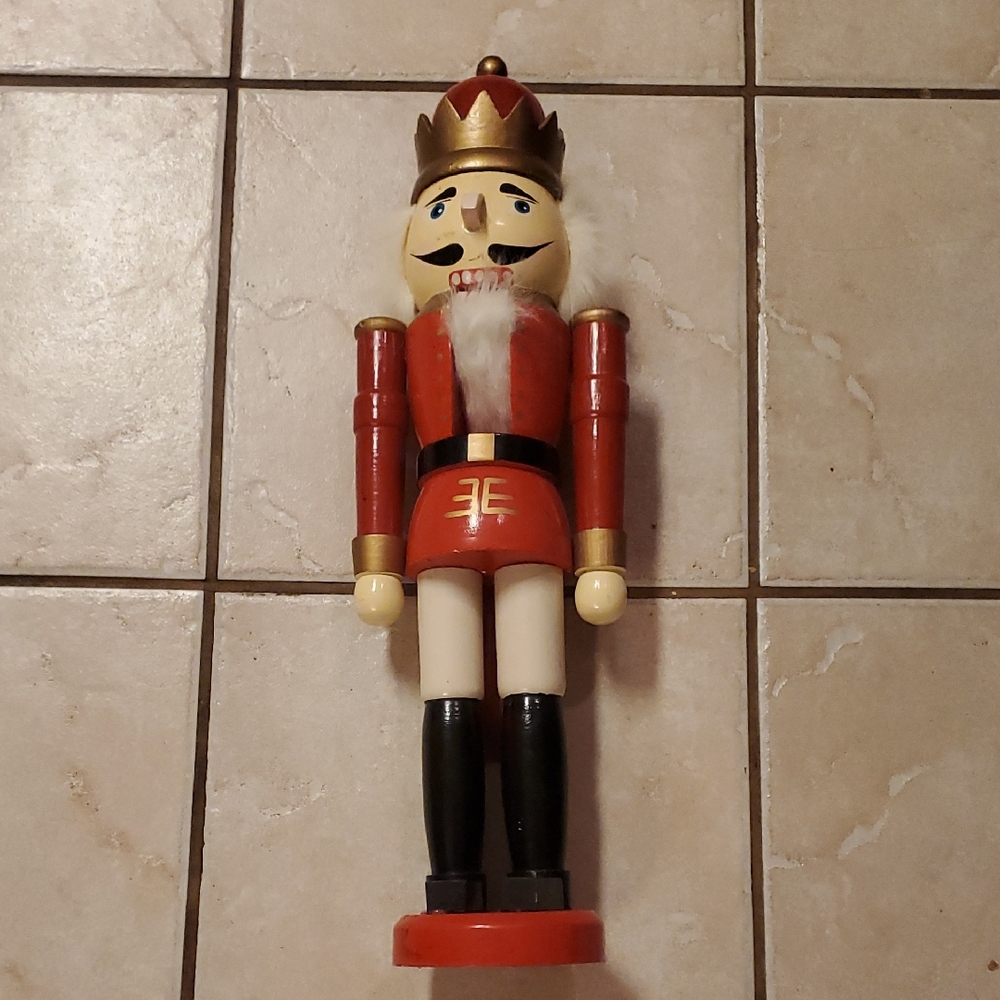 Source Unknown Festive Red and Gold Nutcracker